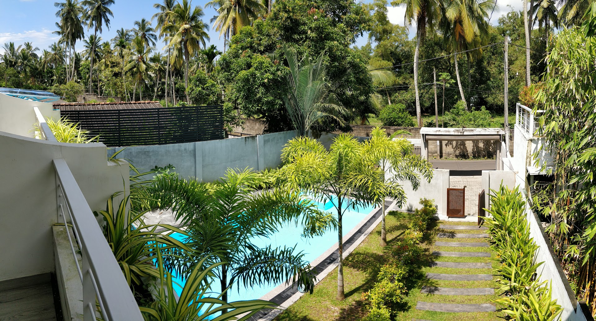 Deltora Villa garden and pool from above, surrounded by tropical greenery, Galle